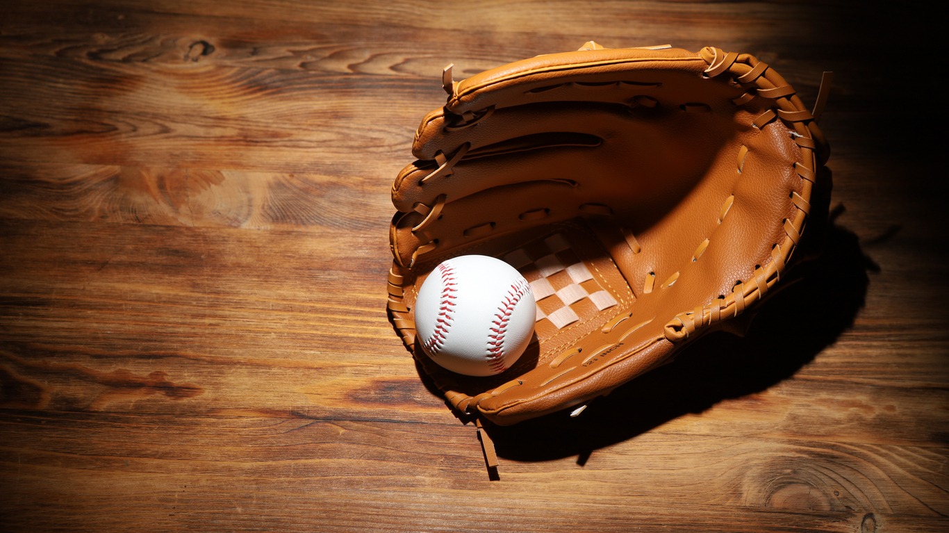 Baseball glove on the wooden table