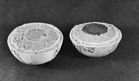 A cork-core baseball and a rubber-core baseball