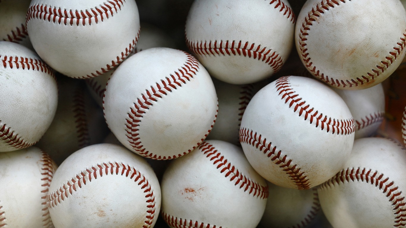 A pile of baseball balls