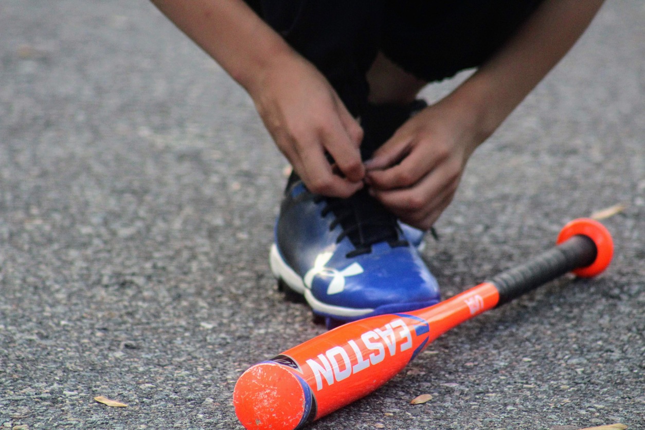 baseball shoes on a cemented floor