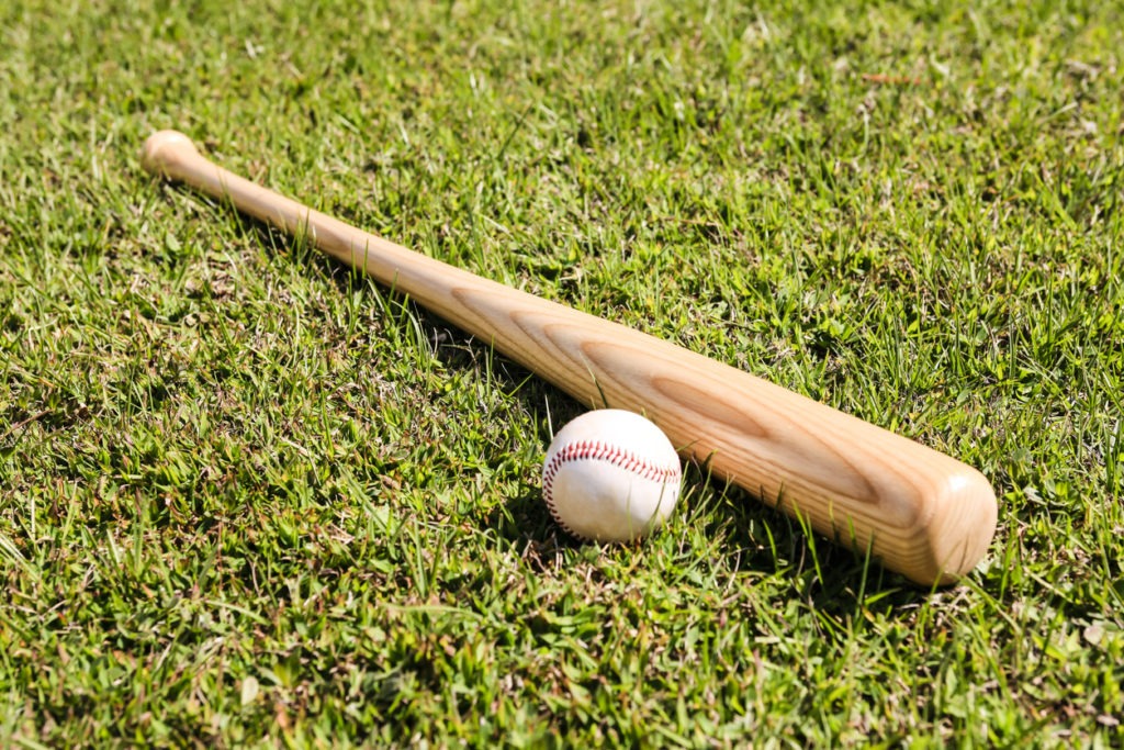 wooden baseball bat and ball