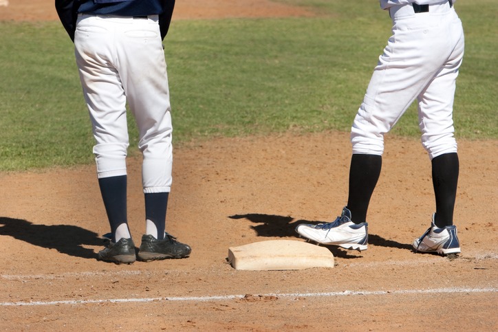 baseball players wearing solid white baseball pants