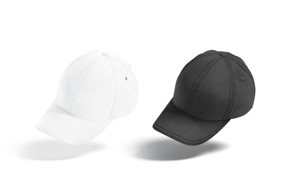 white and black baseball caps