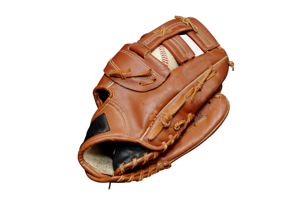 A baseball and a baseball glove